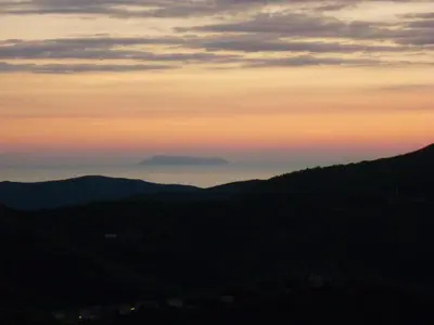 a view of a mountain in the distance at sunset at Casa Valentini in Quercitello