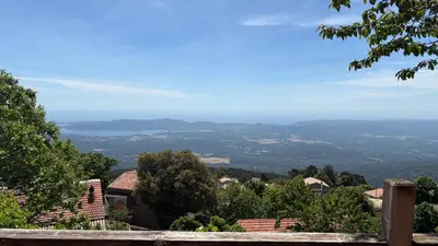 a view of the hills from a house at Maison de charme avec vue imprenable sur le golfe de Porto-Vecchio in Porto-Vecchio