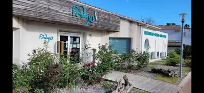 a building with a sign on the side of it at Casa Giul' Poggio Mezzana in Poggio-Mezzana