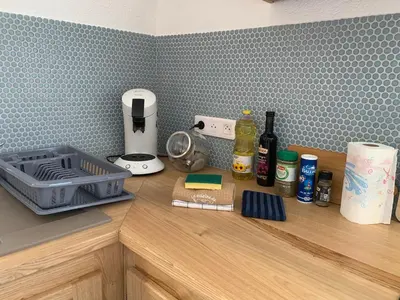 a kitchen counter with a counter top with a blender at Bella Vista in SantʼAntonino