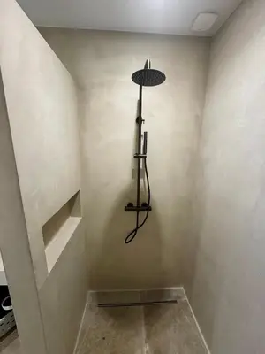 a room with a shelf in the corner of a room at Rez-de-villa 65m2 in Propriano