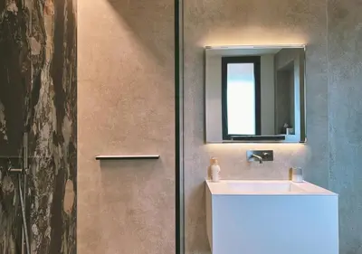 a bathroom with a sink and a mirror at Villa Anjo in Zonza