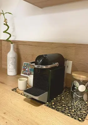 a toaster sitting on top of a kitchen counter at Studio Porto Vecchio centre in Porto-Vecchio