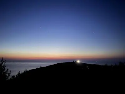 a view of the sunset from the deck of a house at Casa Tre Fari in Bocca del Oro