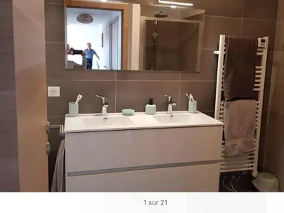 a washing machine and a washer in a room at Porticcio - appartement T3 in Albitreccia