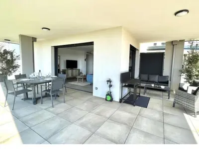 a kitchen with a shelf with tools in it at Porticcio - appartement T3 in Albitreccia