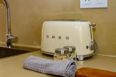 a toaster sitting on top of a kitchen counter at U Vermentinu in Aghione