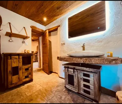 a bathroom with a sink and a counter top at Charming house with sea view Emily in Porri in Porri