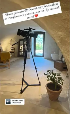 a camera on a tripod in a room at Charming house with sea view Emily in Porri in Porri