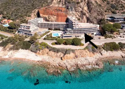 an aerial view of a resort on a cliff at Beau Studio vue sur mer, route des sanguinaires in Ajaccio