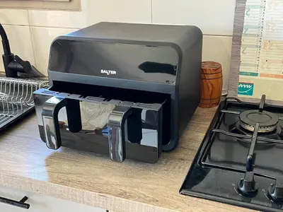 a toaster oven sitting on top of a counter at villa vue mer avec piscine et jardin arboré in Coggia