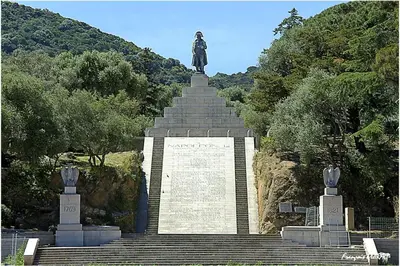 a statue sitting on top of a set of stairs at Maria - 3BR Terrace Panoramic sea view - by TGB in Ajaccio