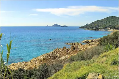 a view of a large body of water with a mountain at Maria - 3BR Terrace Panoramic sea view - by TGB in Ajaccio