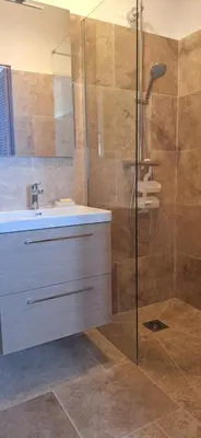 a bathroom with a sink and a shower at Bella vista in Costa