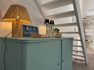 a blue cabinet with a lamp on top of it at Villa Porto Vecchio, calme avec piscine in Porto-Vecchio