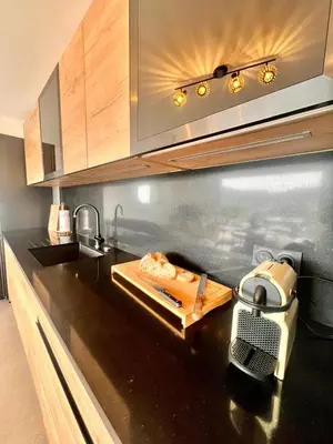 a kitchen with a counter top with a blender on it at Appartement CASA VISTA splendide vue sur le Golfe in Porto-Vecchio