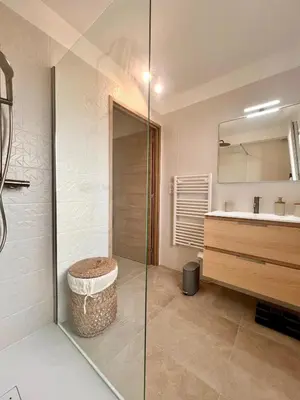 a bathroom with a shower and a sink and a toilet at Appartement CASA VISTA splendide vue sur le Golfe in Porto-Vecchio