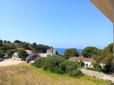 a view of a small village on a hill at Sagone Appartement T3 in Coggia