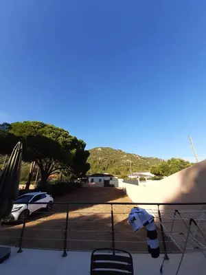 a skateboard on a fence in a parking lot at Clos Jeannette Villa près de la plage de Pinarelle et des piscines naturelles du Cavu in Zonza