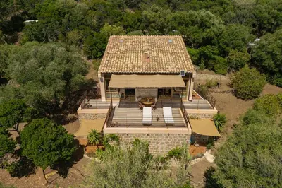 an overhead view of a house with a roof at Signura, maison entre mer et maquis in Piana