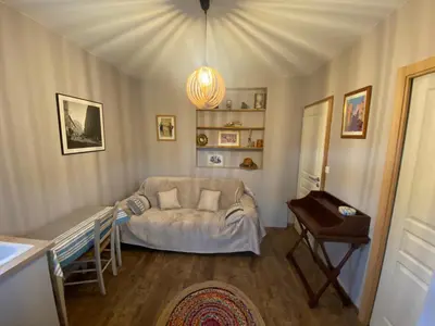 a living room with a couch and a table at Casa Nustrali in Alata