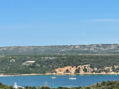 a view of a lake with boats in it at Loue Villa Bonifacio vue mer in Bonifacio