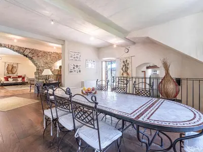a dining room with a table and chairs at Holiday Home Casa Gabrielle by Interhome in Lama
