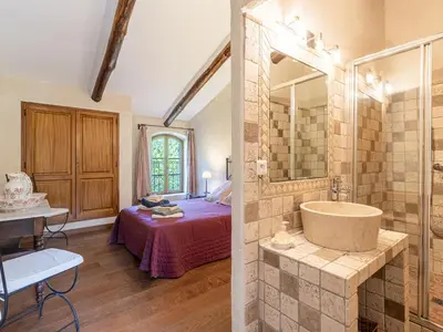 a bathroom with a bed and a tub in a room at Holiday Home Casa Gabrielle by Interhome in Lama