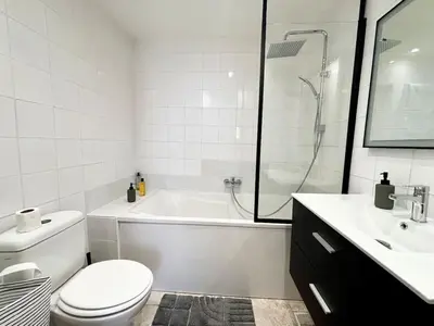 a bathroom with a toilet and a tub and a sink at Casamea - Vieille Ville, 2 min plage, Clim in Ajaccio