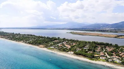 an aerial view of a beach and the water at havre de paix au bord de mer - Casa Marina in Borgo