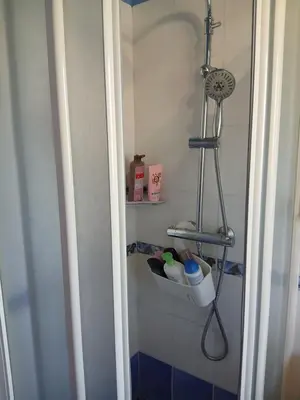 a bathroom with a shower with a shower at Chez Rachel chambre et salle bain privative chez l'habitant in Aléria