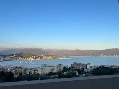 a view of a city and a body of water at Beautiful Appartment Les terrasses de Torretta room sea view Ajaccio in Ajaccio