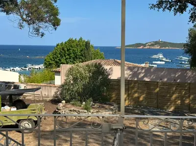 a view of the ocean from a yard at Casa Amore Pinarello in Zonza