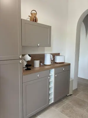 a kitchen with a counter with a counter top at Casa Pitrina in Viggianello