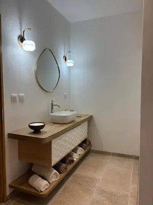 a bathroom with a sink and a mirror at Casa Pitrina in Viggianello