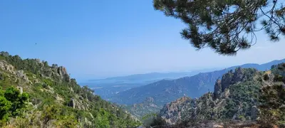 a view of a valley from a mountain at Dormir à Pinarello Corse du Sud 4 pers Vue Mer in Sainte-Lucie de Porto-Vecchio