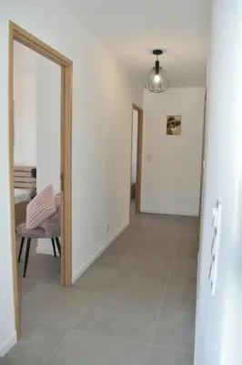 a hallway with a door leading into a room at Alivu bergerie Sotta hyper cosy in Sotta