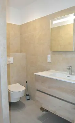 a bathroom with a sink and a toilet at Alivu bergerie Sotta hyper cosy in Sotta