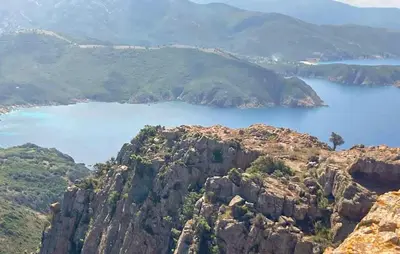 a view of a mountain with a body of water at Cozy Apartment In Piana in Piana