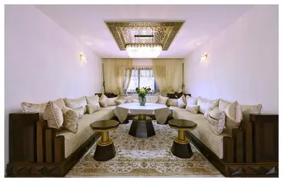a living room with a couch and a table at Villa neuve perchée - Vue splendide in Zonza