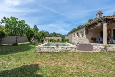 a house with a swimming pool in a yard at La bergerie 1 in Bonifacio