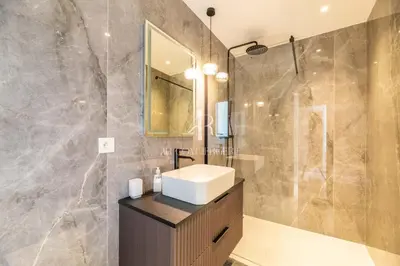 a bathroom with a sink and a mirror at Villa Cala Serena in Zonza