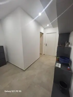 an empty room with a white wall and a white floor at T2 Ajaccio centre in Ajaccio