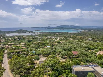 an aerial view of a town and a lake at Chalet Caseddu D'Arasu by Interhome in Sainte-Lucie de Porto-Vecchio