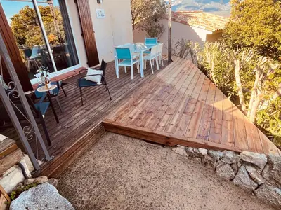 a view of the mountains from the roof of a house at Villa Cala Longa - Porto Vecchio in Sotta