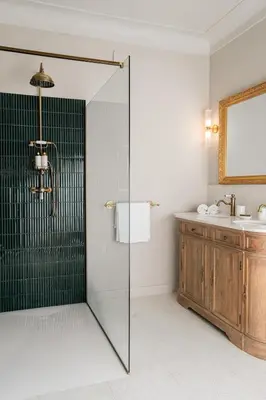 a bathroom with a glass shower and a sink at Torra di l alba in Viggianello