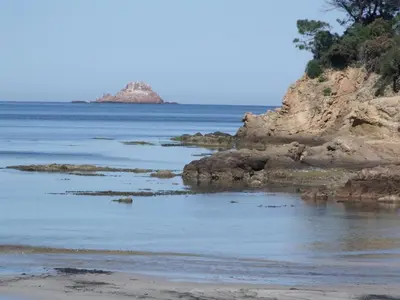a view of the ocean from the beach at Hôtel du Golfe Pinarello in Pinarellu