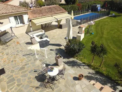 an overhead view of a patio with a table and chairs at Bed and Breakfast in LʼArena