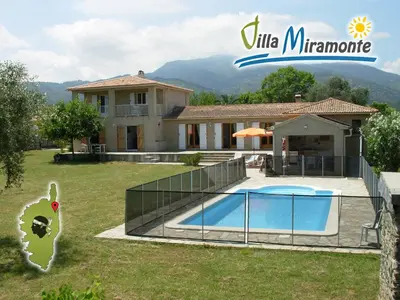 a villa with a swimming pool and a house at Bed and Breakfast in LʼArena