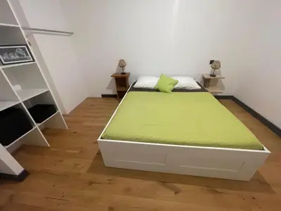 a bedroom with a bed with a green mattress at Villa de luxe Piscine 5 chambre in Vescovato